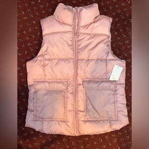 New vest. Size large. Pink nice with a pair of jeans